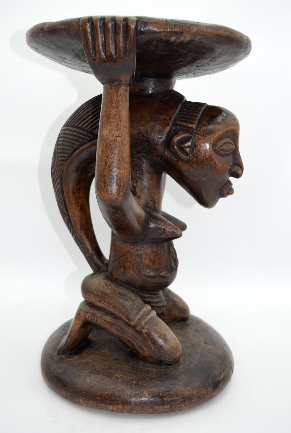An African tribal wooden stool. 43 x 28cm - Image 2 of 5