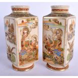 A PAIR OF LATE 19TH CENTURY JAPANESE MEIJI PERIOD SATSUMA VASES painted with figures. 23 cm high.