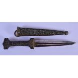 A 19TH CENTURY EUROPEAN BRONZE DAGGER decorated with mask heads and foliage. 27 cm long.