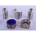 A VICTORIAN FIVE PIECE SILVER CRUET SET. Silver 160 grams. Largest 7 cm x 5 cm. (5)