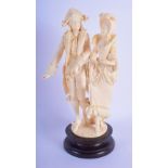 A LARGE 19TH CENTURY EUROPEAN DIEPPE CARVED IVORY FIGURE OF A DANDY AND FEMALE modelled upon turned