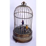 AN EARLY 20TH CENTURY EUROPEAN AUTOMATON SINGING BIRD CAGE with embossed banding. 29 cm high.
