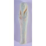 AN EARLY EGYPTIAN FAIENCE GLAZED USHABTI AMULET. 6 cm high.