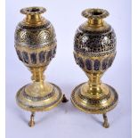 A PAIR OF 18TH /19TH CENTURY INDIAN SILVER INLAID COCONUT SHELL VASES decorated with foliage and vin