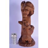 A LARGE EARLY 20TH CENTURY BLACK FOREST BAVARIAN WOOD FIGURE OF BEARS modelled playing upon a stump.