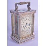 A SILVER PLATED MAPPIN & WEBB LTD DIANA AND CHARLES CARRIAGE CLOCK. 15 cm high.