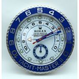 A Contemporary Rolex Dealer display wall clock 34cm.