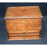 An antique small 3 drawer, top opening cabinet. Probably for medicinal purposes. 24 x 18 x 18cm