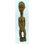 An African tribal Baule figure. 48cm