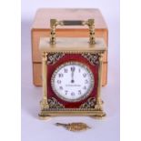 A CONTEMPORARY SILVER GILT ENAMEL AND DIAMOND CARRIAGE CLOCK decorated with scrolling foliage and vi
