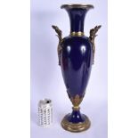 A LARGE 19TH CENTURY FRENCH SEVRES TWIN HANDLED PORCELAIN VASE with gilt metal mounts. 50 cm high.
