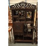 A GOOD 19TH CENTURY CHINESE HONGMU HARDWOOD DISPLAY CABINET decorated with dragons and foliage. 180