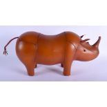 A CONTEMPORARY BROWN LEATHER RHINOCEROS. 55 cm x 28 cm.