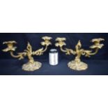 A pair of 19th century gilded ormolu table mounted candle sticks 22 x 36cm (2).