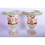 A LARGE PAIR OF 19TH CENTURY MEISSEN PEDESTAL PORCELAIN VASS decorated with pan and other figures wi