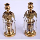 A PAIR OF REGENCY GILT METAL LUSTRE PINEAPPLE CANDLESTICKS. 21 cm high.