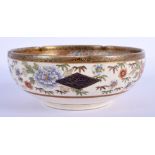 A 19TH CENTURY JAPANESE MEIJI PERIOD SATSUMA BARBED BOWL painted with geisha in landscapes. 13 cm wi