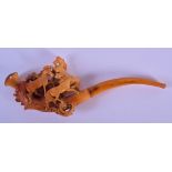 A 19TH CENTURY EUROPEAN CARVED AMBER AND MEERSCHAUM PIPE depicting horses amongst landscapes. 19 cm