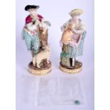 A PAIR OF 19TH CENTURY MEISSEN PORCELAIN FIGURES both modelled beside lamb. 21 cm high.