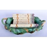 A LARGE 19TH CENTURY TWIN HANDLED MAJOLICA ASPARAGUS DISH of naturalistic form. 34 cm x 24 cm.