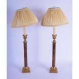 A PAIR OF ANTIQUE GRAND TOUR IMITATION STONE CANDLESTICKS converted to lamps. Candle 30 cm high.