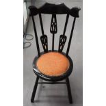 AN ARTS AND CRAFTS EBONISED SINGLE CHAIR Attributed to Liberty & Co. 78 cm x 28 cm.