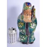 A LARGE 19TH CENTURY JAPANESE AO KUTANI PORCELAIN FIGURE OF AN IMMORTAL modelled holding a staff. 32