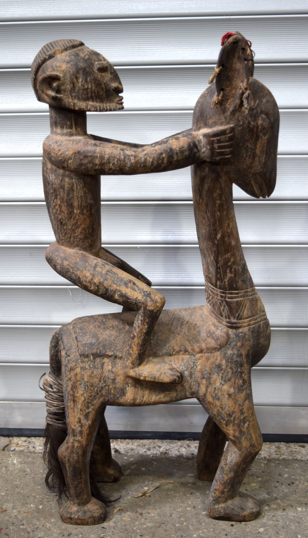 An African tribal Dogon Horseman figure. 98 x 44cm