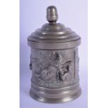 A RARE 19TH CENTURY PEWTER TEA CADDY AND COVER decorated with punch and other figures in various pur