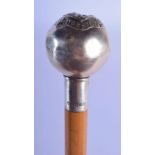 AN ANTIQUE MILITARY SILVER TOPPED SWAGGER STICK. 67 cm long.