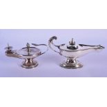 A NEAR PAIR OF ANTIQUE SILVER GENIE LAMPS. London 1914 & Sheffield. 300 grams. 12.5 cm x 7.5 cm.