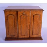 A LARGE LATE VICTORIAN OAK FREE STANDING DESK CABINET in the manner of Asprey's, with Art Nouveau ha