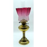 A Brass oil lamp 55cm.