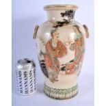 A 19TH CENTURY JAPANESE MEIJI PERIOD SATSUMA VASE painted with figures in landscapes. 29 cm high.