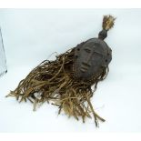 An African tribal Senufo Kpelie mask. 62cm