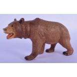 AN EARLY 20TH CENTURY 20TH CENTURY BAVARIAN BLACK FOREST BEAR modelled roaming. 16 cm x 11 cm.