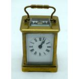A Small brass carriage clock 9cm.