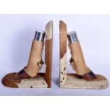 A PAIR OF ART DECO GIRAFFE FOOT BOOKENDS. 25 cm x 14 cm.