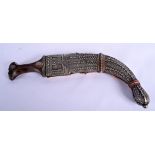 A 19TH CENTURY MIDDLE EASTERN OMANI RHINOCEROS HORN HANDLED JAMBIYA DAGGER inset with coins. 36 cm l