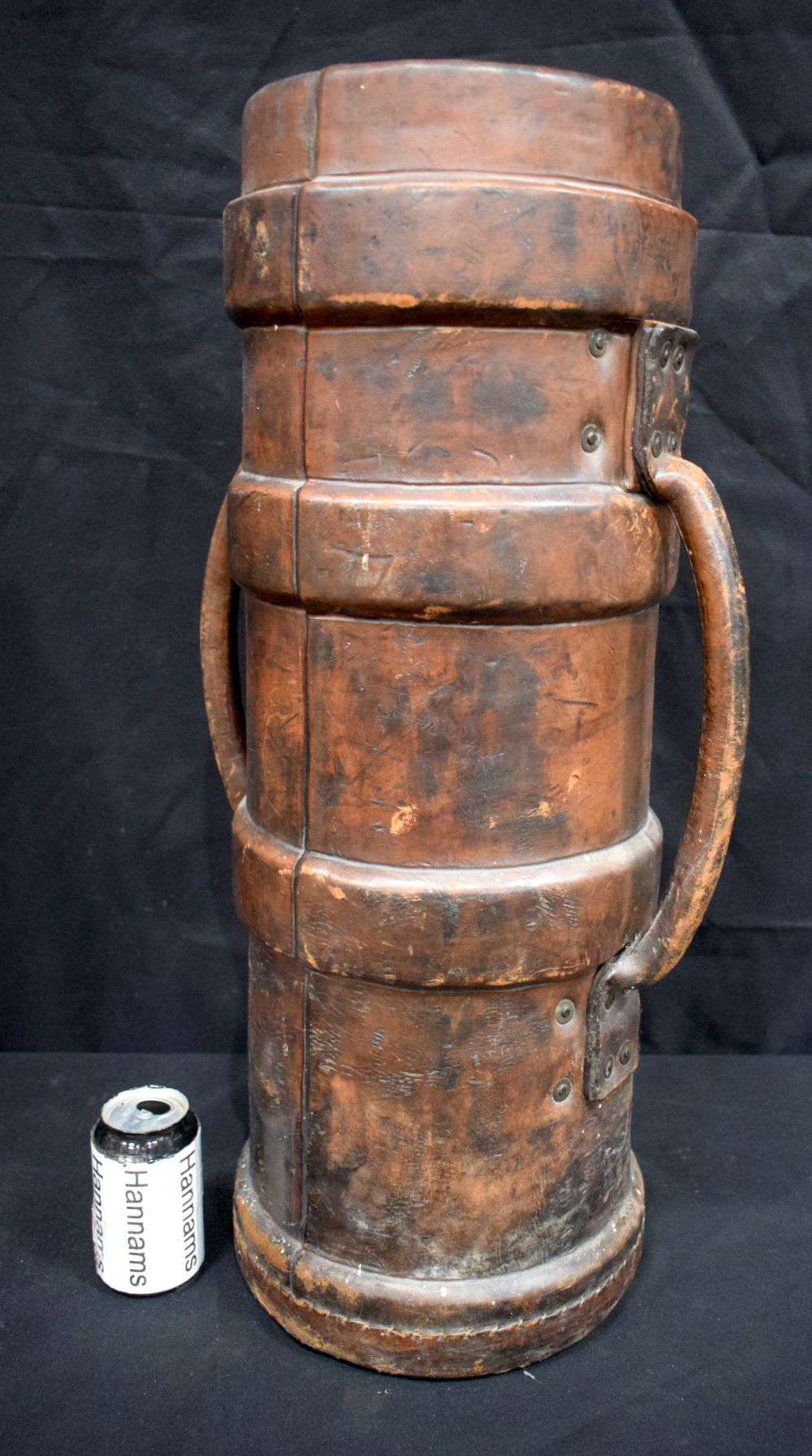 A large antique military leather cartridge carrier converted to a stick stand . 70 x 23cm.