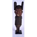 A VINTAGE AFRICAN TRIBAL CARVED WOOD HOUSE MARKER. 48 cm high.