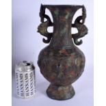 A LARGE CHINESE TWIN HANDED BRONZE VASE 20th Century, decorated with mask heads. 30 cm x 13 cm.
