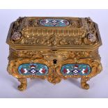 A MID 19TH CENTURY FRENCH GILT BRONZE AND ENAMEL CASKET decorated with foliage and vines.