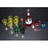 A collection of vintage coloured & engraved glasses together with a decanter. 30cm (18)