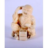 A 19TH CENTURY JAPANESE MEIJI PERIOD CARVED IVORY NETSUKE modelled as a male scratching his head. 3.