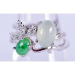 TWO SILVER AND JADE RINGS. Size L/M. Weight 3g (2)