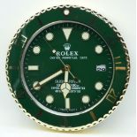 A contemporary Rolex dealership clock 34cm