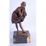 AN ART DECO BRONZE ABD MARBLE FIGURE OF A FEMALE modelled leaning upon her clasped hands. 24 cm x 9