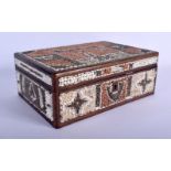 A VERY RARE 19TH CENTURY CONTINENTAL CARVED SHELL WORK FOLK ART CASKET decorated with houses. 25 cm