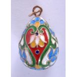 A CONTINENTAL SILVER AND ENAMEL EGG PENDANT. 3.3cm long, weight 9g